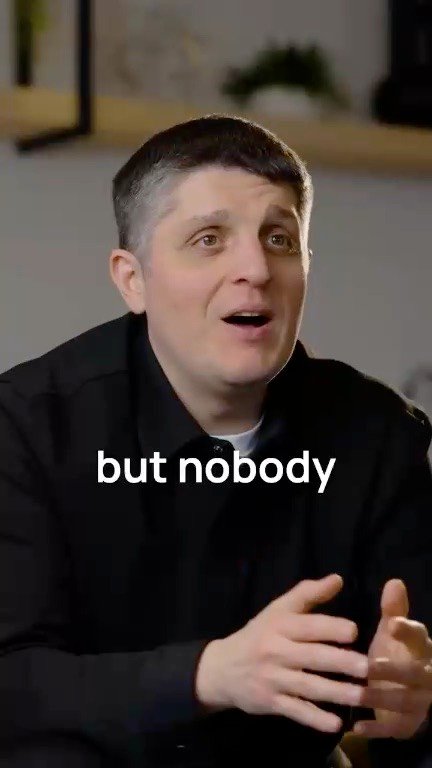 Still from an English talking-head reel with burned-in captions